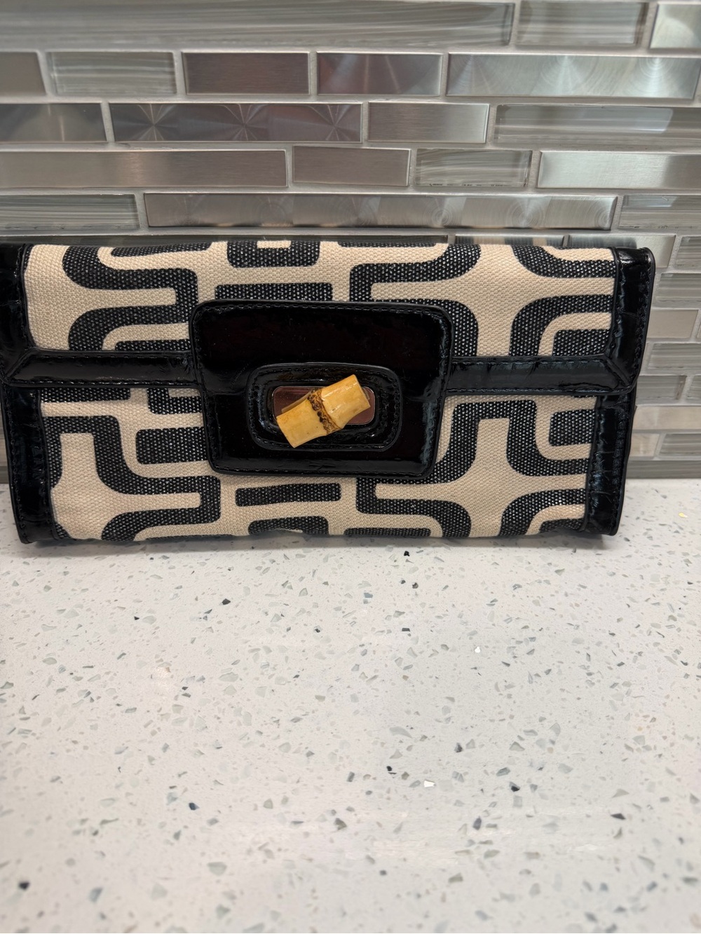 Sondra Roberts Black and Cream Geometric Canvas Clutch with Bamboo Accent